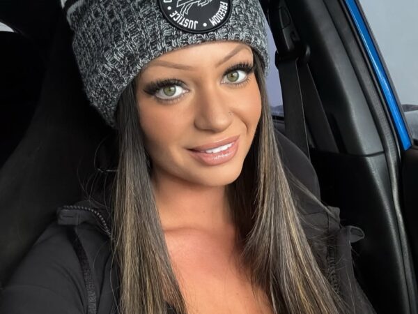 Casey Mae in black outfit and bonnet