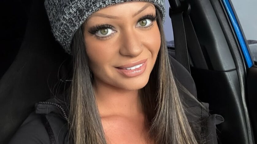 Casey Mae in black outfit and bonnet