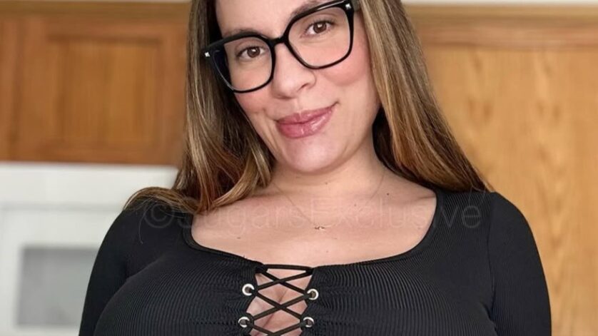 Mia Taylor in bra top wearing glasses