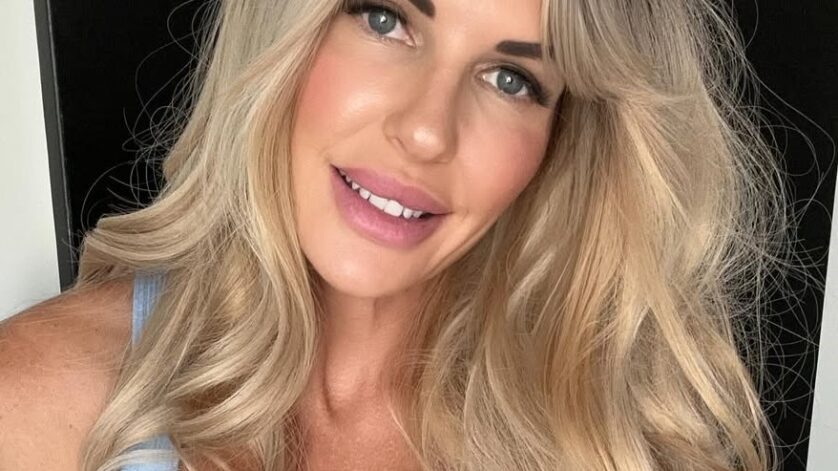 Vivian Fox taking a selfie with cleavage