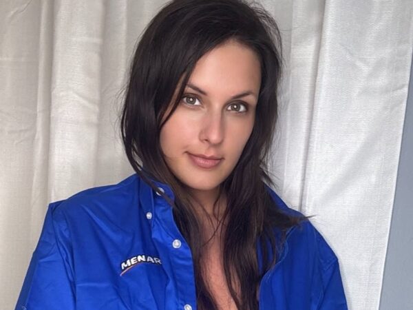 Barefoot Mama wearing an unbuttoned blue dress shirt