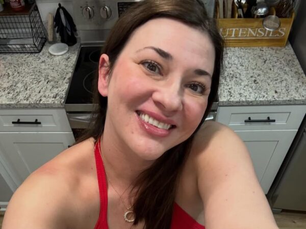 WorldClassKitty wearing a red tank top