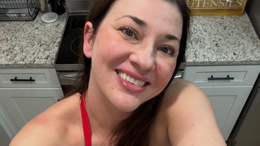 WorldClassKitty wearing a red tank top