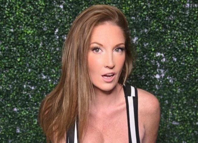 April Cali with her cleavage showing