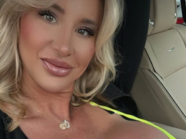 barbie body builder wearing a bikini in the car