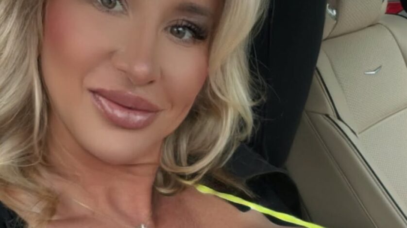 barbie body builder wearing a bikini in the car