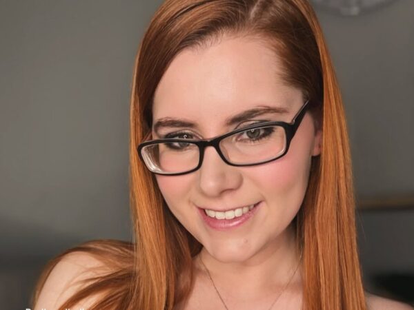 holly rose wearing black glasses