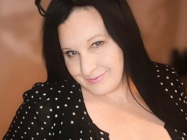 Lacey Lane wearing a black outfit