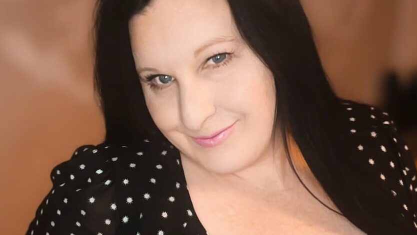 Lacey Lane wearing a black outfit