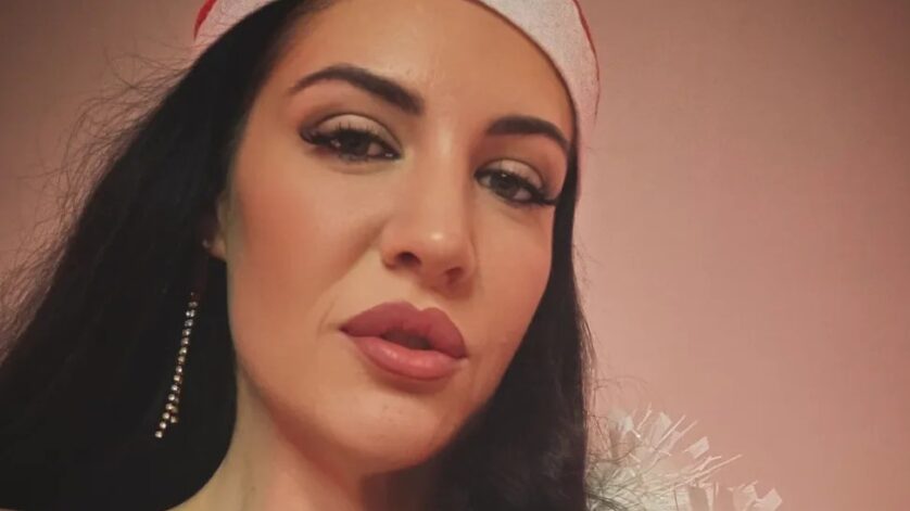 Scarlett Nash wearing a santa hat