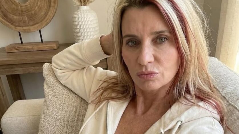 Amanda Dalton wearing lounge wear at her living room couch